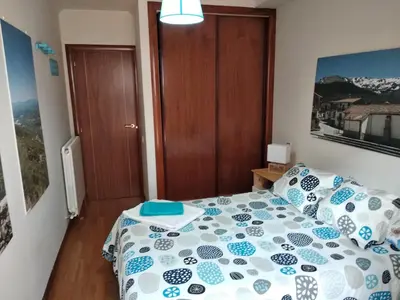 Cama o camas de una habitación en PEÑUELAS 7 Bajo