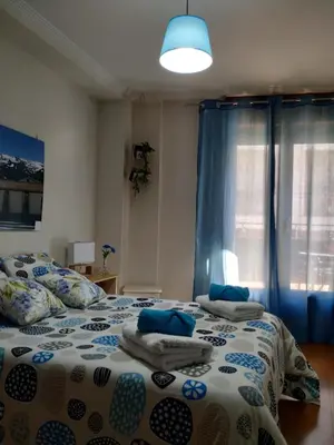 Cama o camas de una habitación en PEÑUELAS 7 Bajo