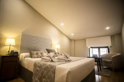 Cama o camas de una habitación en MD Casa Palacio Muñoz Chaves Siglo XVIII