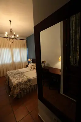 Cama o camas de una habitación en La Senda de los Enebros