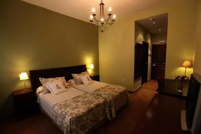 Cama o camas de una habitación en La Senda de los Enebros