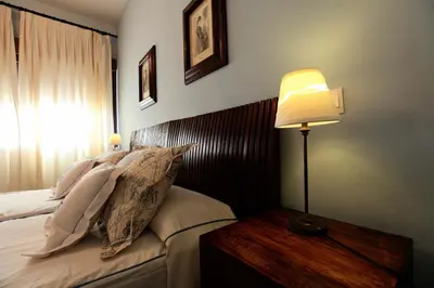 Cama o camas de una habitación en La Senda de los Enebros