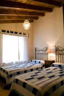 Cama o camas de una habitación en Casa rural La Rasa