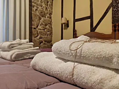 Cama o camas de una habitación en Posada de Candelario