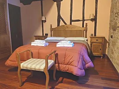 Cama o camas de una habitación en Posada de Candelario