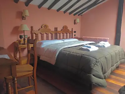 Cama o camas de una habitación en Posada de Candelario