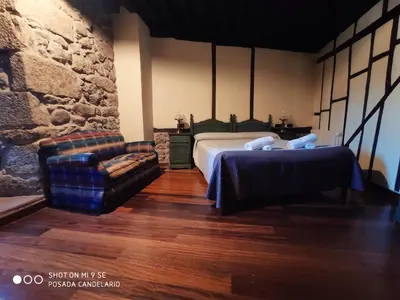 Cama o camas de una habitación en Posada de Candelario