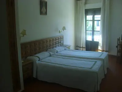 Cama o camas de una habitación en Hotel Hispanidad