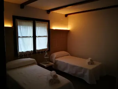 Cama o camas de una habitación en La pension del Parador