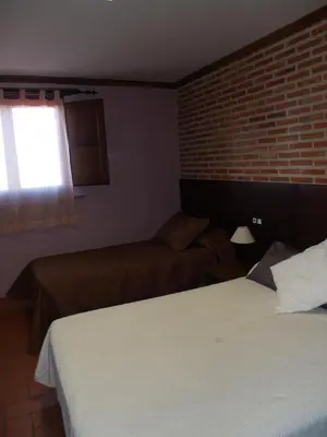 Cama o camas de una habitación en Hotel Rural El Rocal