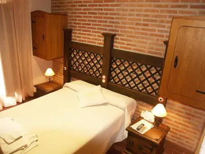 Cama o camas de una habitación en Hotel Rural El Rocal