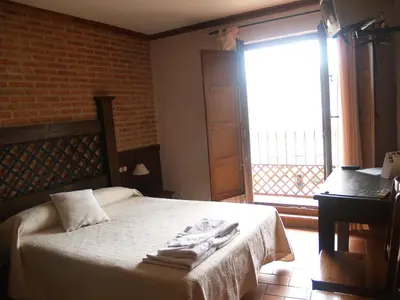 Cama o camas de una habitación en Hotel Rural El Rocal
