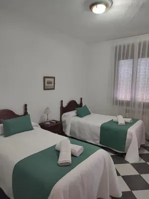 Cama o camas de una habitación en Hostal El Fogon De Felisa