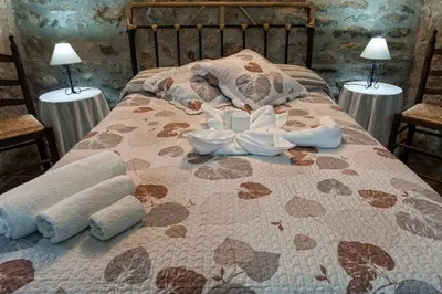 Cama o camas de una habitación en Apartamentos Rurales La Casa de Luis