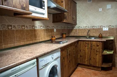 Una cocina o zona de cocina en Apartamentos Rurales La Casa de Luis