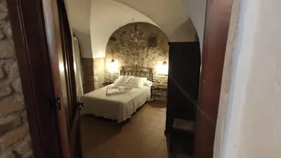 Cama o camas de una habitación en Apartamentos Rurales La Casa de Luis