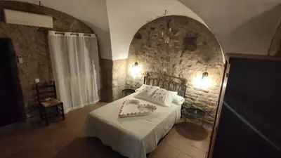 Cama o camas de una habitación en Apartamentos Rurales La Casa de Luis