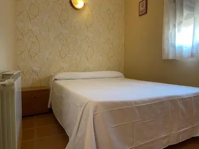 Cama o camas de una habitación en Apartamentos Rurales 