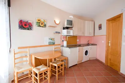Una cocina o zona de cocina en Apartamentos Rurales 