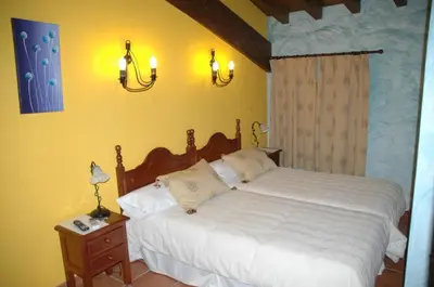 Cama o camas de una habitación en Casa Rural El Pedroso