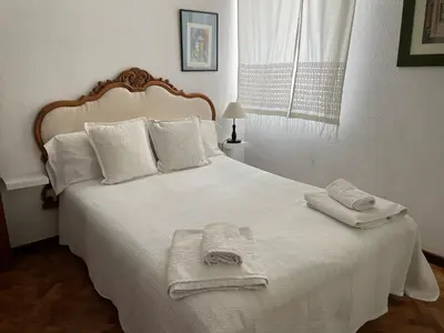 Cama o camas de una habitación en Piso Urbano Garcia De la Cruz