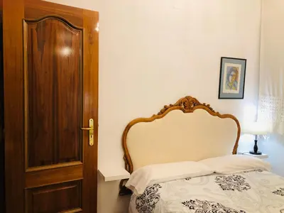 Cama o camas de una habitación en Piso Urbano Garcia De la Cruz