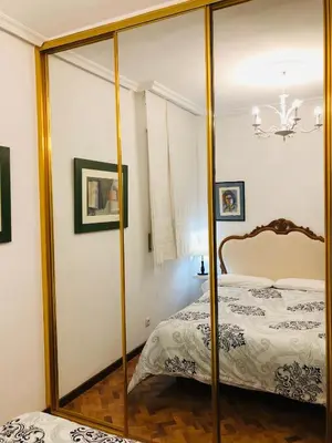 Cama o camas de una habitación en Piso Urbano Garcia De la Cruz