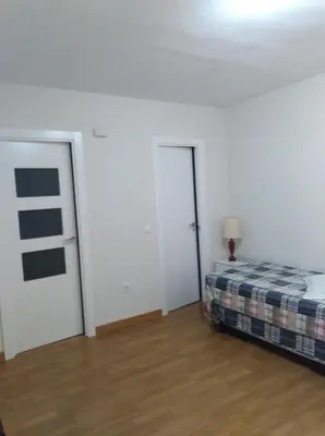Cama o camas de una habitación en Apartamento Turístico Príncipe Cáceres AT-CC-00415