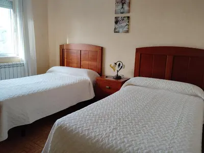 Cama o camas de una habitación en La Fuente de la Covatilla