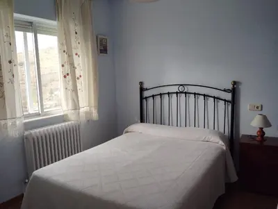 Cama o camas de una habitación en La Fuente de la Covatilla