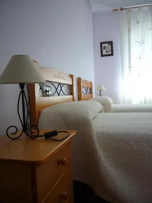 Cama o camas de una habitación en La Fuente de la Covatilla