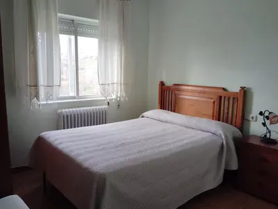 Cama o camas de una habitación en La Fuente de la Covatilla