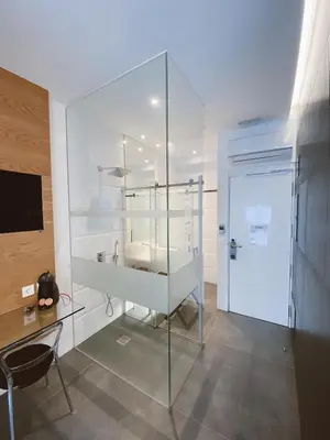 Una televisión o centro de entretenimiento en Salamanca Suites Libertad