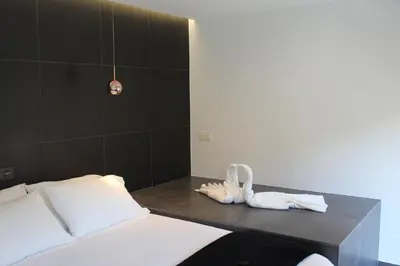 Cama o camas de una habitación en Salamanca Suites Libertad