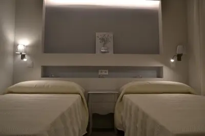 Cama o camas de una habitación en Hotel Español