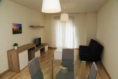 Una televisión o centro de entretenimiento en Apartamento turisticos Puente Romano P4 1-A