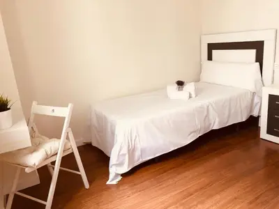Cama o camas de una habitación en Apartamento turisticos Puente Romano P3 2-B