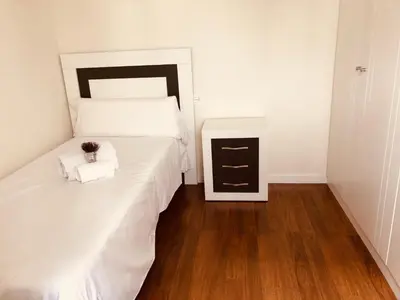 Cama o camas de una habitación en Apartamento turisticos Puente Romano P3 1-B