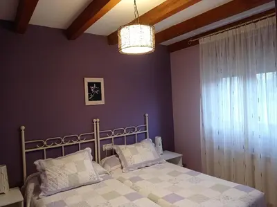Cama o camas de una habitación en casa rural EL RINCON