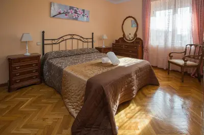 Cama o camas de una habitación en Apartamentos Turisticos Avila Villa Carmen II