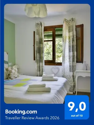 Cama o camas de una habitación en El Rincón de Elsa VuT AV296