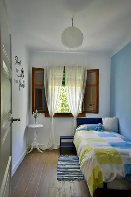 Cama o camas de una habitación en El Rincón de Elsa VuT AV296
