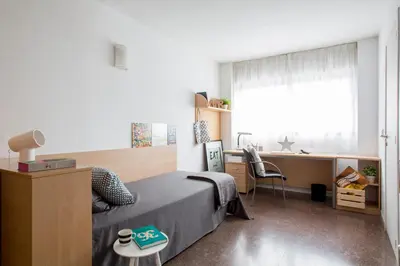 Cama o camas de una habitación en Residencia Universitaria Resa Colegio de Cuenca