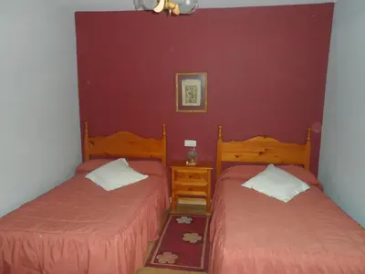 Cama o camas de una habitación en La Puente 10 de Gredos