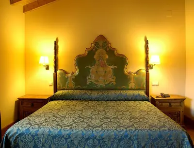 Cama o camas de una habitación en Hotel Garabatos