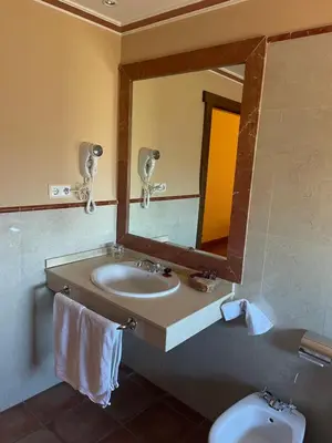 Un baño de Hotel Garabatos