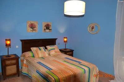 Cama o camas de una habitación en Apartamentos Rurales Natura