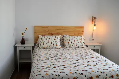 Cama o camas de una habitación en Nova Domus Apartamentos
