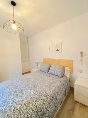 Cama o camas de una habitación en Nova Domus Apartamentos