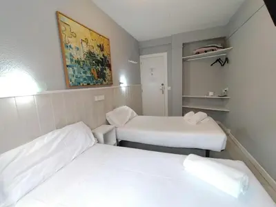Cama o camas de una habitación en Hostal Albero by gaiarooms